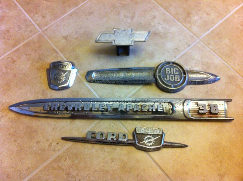 Lot of vintage ford, chevy emblems