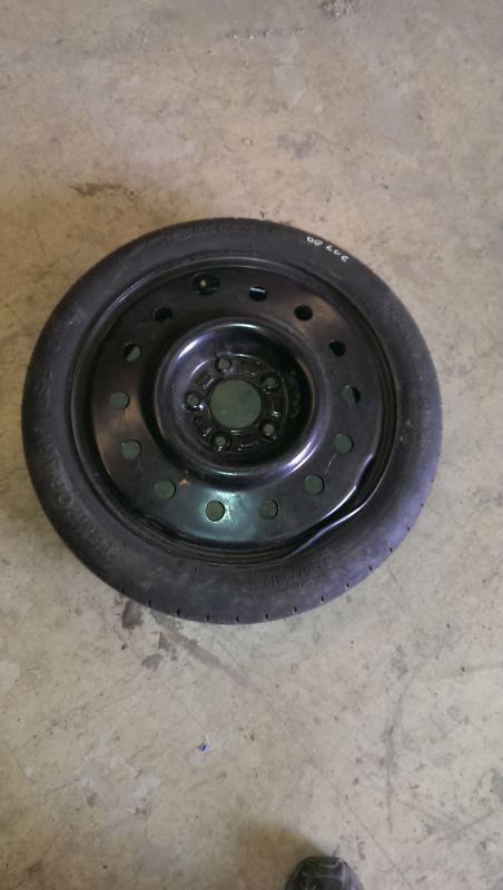 2006 05-11  buick lucerne  spare tire 125x70x16  (has a bend but works fine)