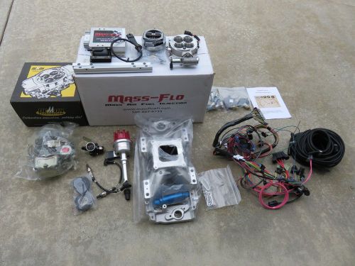 Mass-flo fuel injection system, demon 850 carb, edlebrock manifold, mallory dist