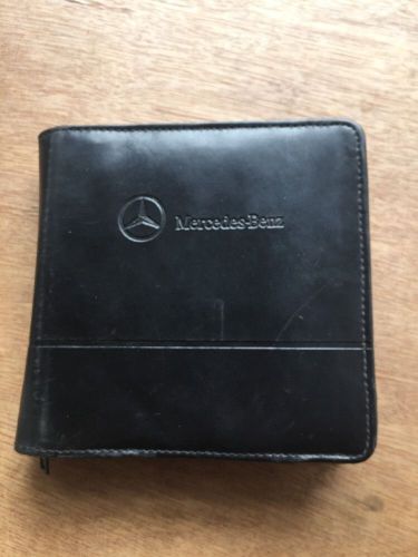 Mercedes benz cd dvd disc navigation storage leather case holder oem used