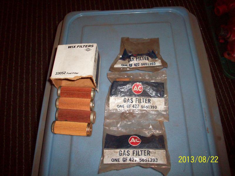 Nos gm ac gf427 and wix 33052 fuel gas filters  gm w/rochester carb lot of 7 pcs