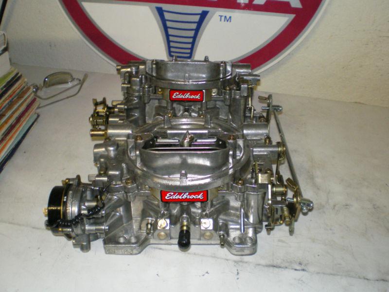 Edelbrock dual quad carbs 600 cfm with linkage and finned fuel filter