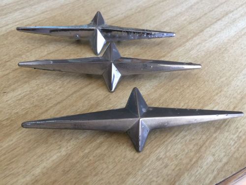 3 pontiac star emblems badges starburst 1955 1956 1957 1958 starchief
