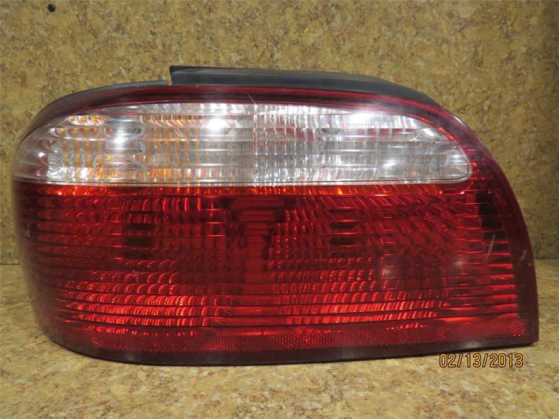 Mazda 626 2000-2002 rear driver side combonation lamp tail light 2001