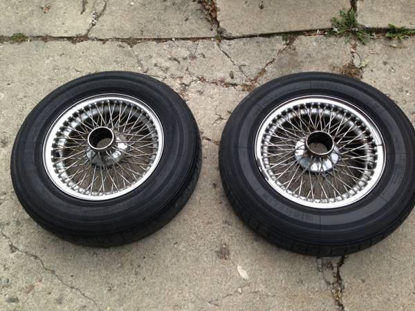 Three jaguar xke e-type wire wheels - two with michelins, one goodyear - look!!