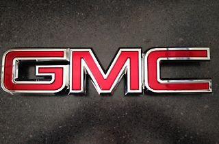 Gmc oem front grille emblem 