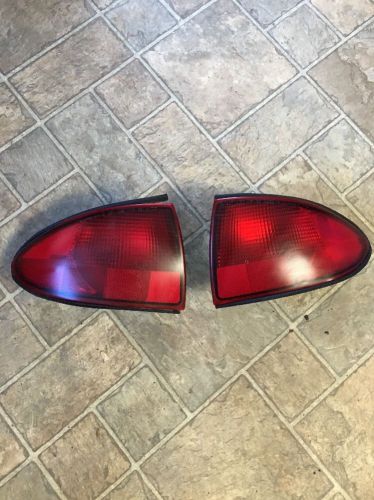 1995 1996 chevrolet cavalier left and right tail lights