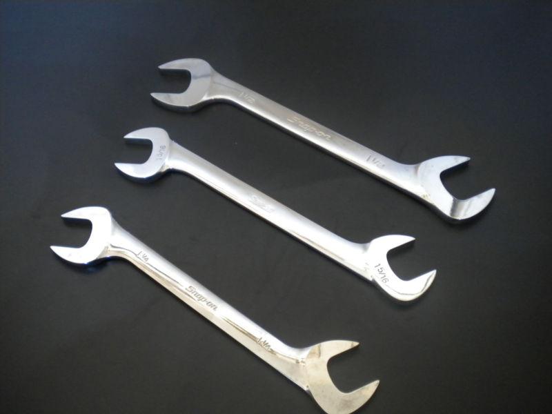 3 huge snap-on  four way angle head open end wrenches. 1-1/4", 1-5/16", 1-1/2".
