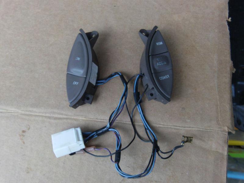 97-98 lincoln mark viii pair of right and left cruse  control switches