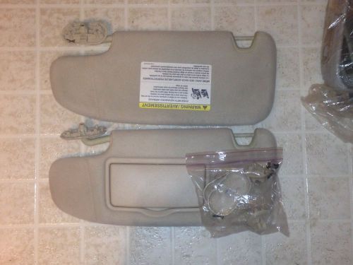 2006-2012 ford fusion taupe/creme sun visors with clips and screws