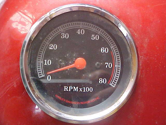 Harley davidson full gas tank with built in tachometer. burgundy color.