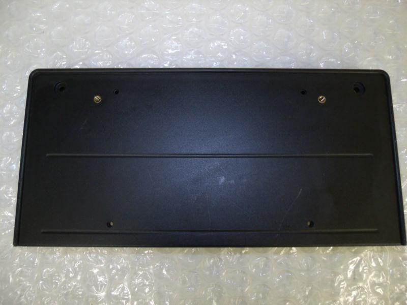 2004-2009 bmw 3 series factory oem front bumper license plate frame base black