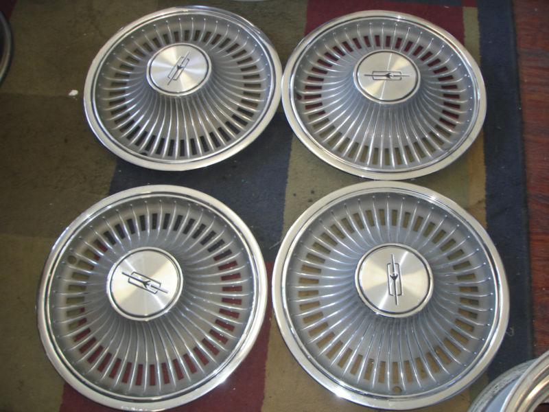 Oldsmobile olds 14" factory oem vintage hubcaps hub caps