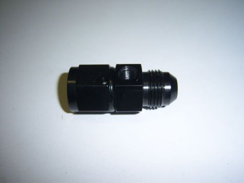 An #6 fuel gauge adapter 1/8 npt black