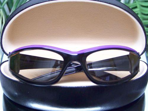 Ladies transition lens padded motorcycle sunglasses purple and black frame  