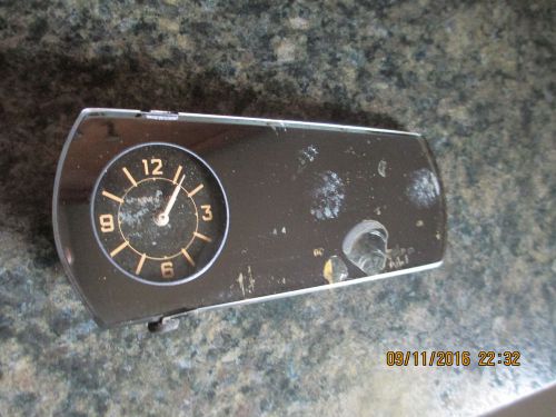 Vintage rear view mirror clock