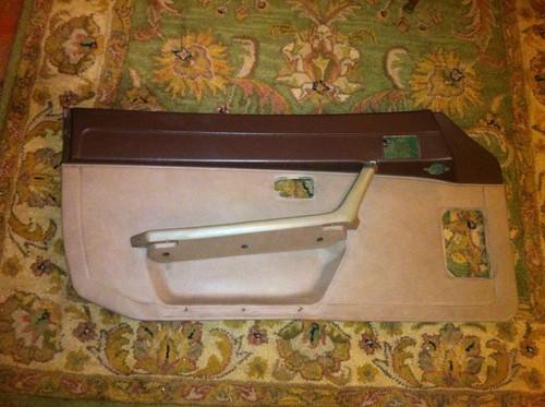 Porsche 944 beige/brown oem '82-'85.5 driver/left door panel with arm rest