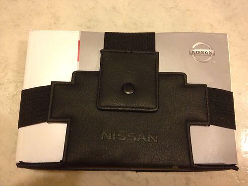 2011 nissan rogue owners manual, case and added books