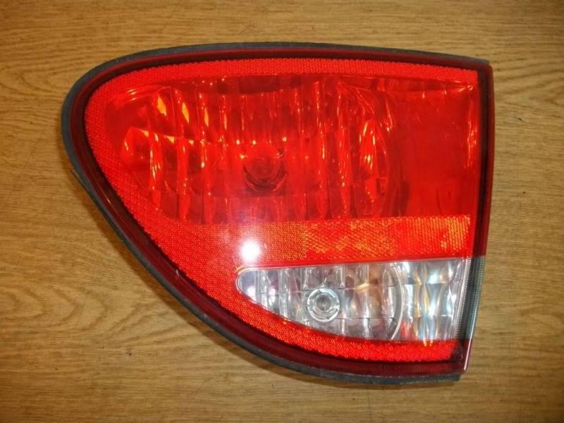 99-04 alero driver side inner tail light - right side trunk lid/deck mounted lh