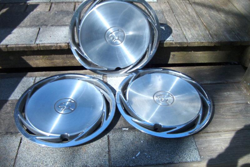 Three oe 15 inch wheelcovers, 1989-92 mercury cougar, 8 slot directional # 878