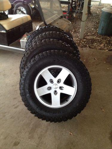 Jeep wrangler wheels and tires brand new 2012