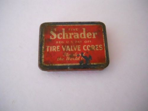 Vintage schrader tire valve cores tin box with key and cores