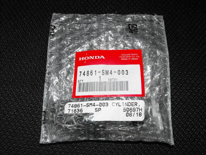 Honda accord trunk cylinder with keys new in manufacture package never opened
