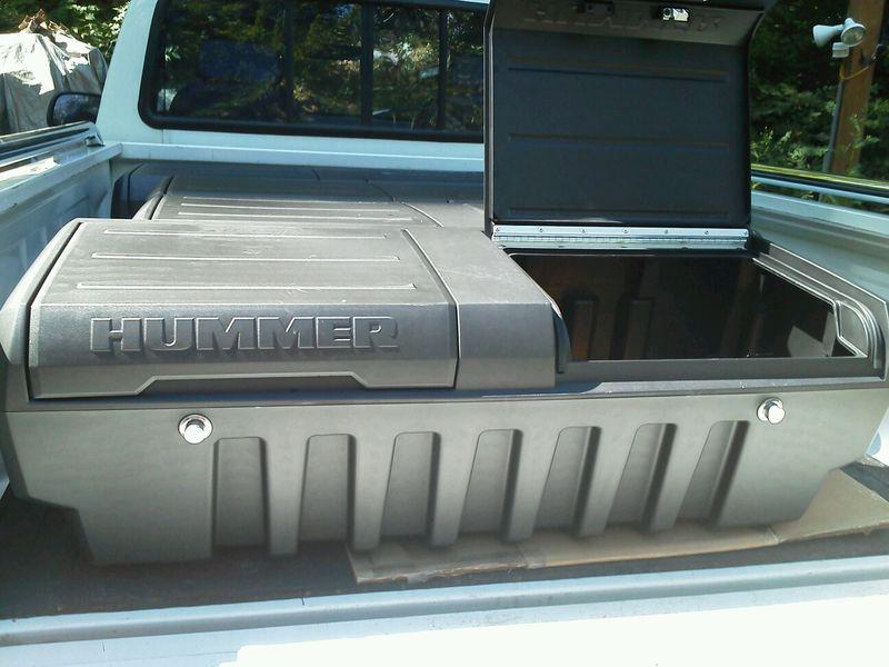 New in box gm # 19166992 pickup storage/tool box  dark gray with hummer logo low