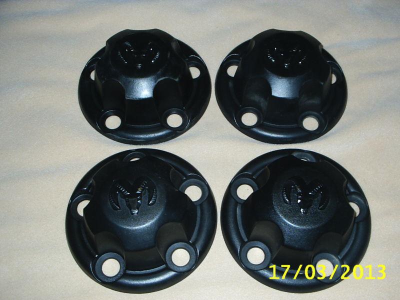 Set of 4 oem 1994-03 dodge ram truck van black plastic wheel center caps hubcaps