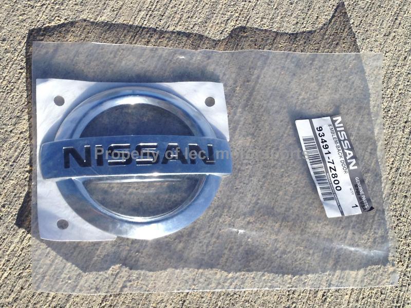 New genuine oem nissan 2002-2004 xterra rear lift gate emblem badge 93491-7z800
