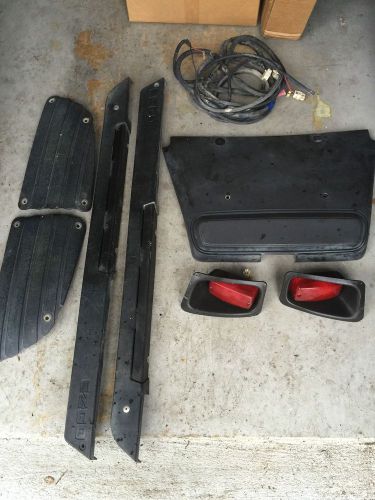 Ezgo golf cart parts lot tail lights, wire harness, shock cover, scuff guards
