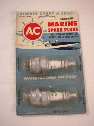 Vintage outboard marine spark plugs-mercury outboards