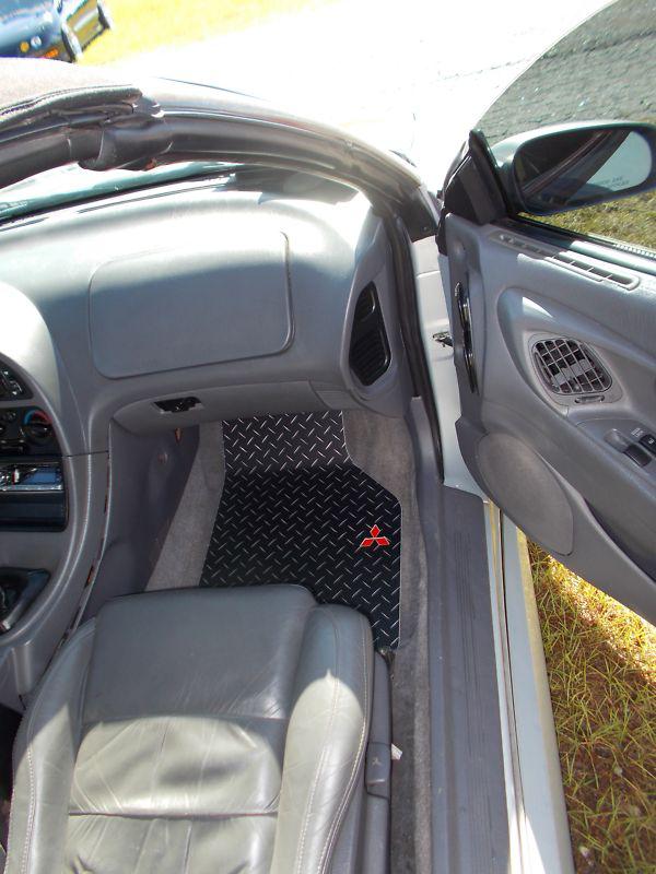 Eclipse   black with exposed metal diamond floor mats.  summer clearance no res