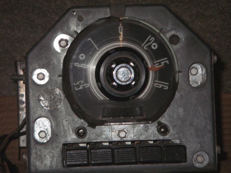 Vintage 1955  ford 6 volt am push button radio with chrome bezel ring 