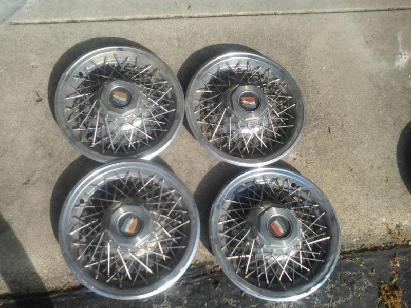 Buick factory spoke hubcaps