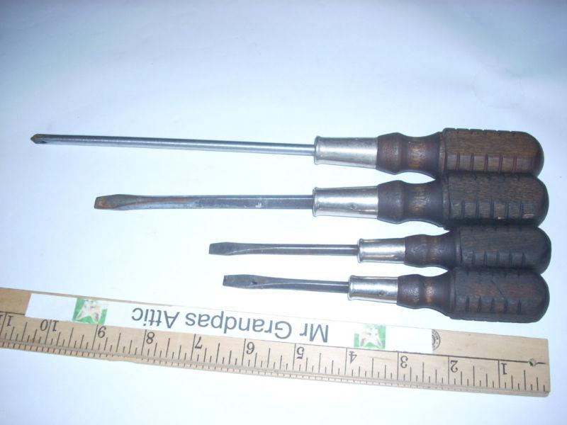 4 wood handle screwdrivers 12” philips, 10”,  6 3/4” and  7 1/4” flat  vintage