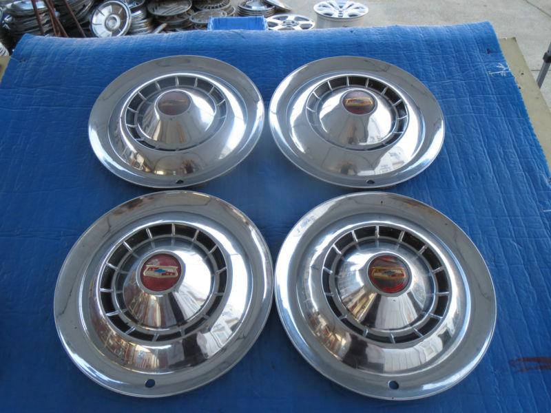 Set of 4 used 1954 chevrolet 15" hubcaps wheel covers oem sj3