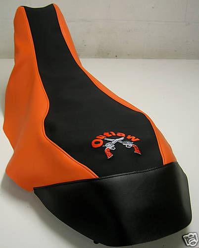 Polaris outlaw 500 525 black gripper/ orange  seat cover 