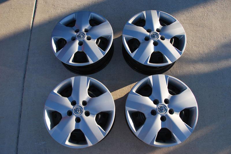 16 inch rims with hub caps and lug nuts - off of toyota rav 4