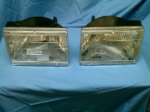 1993-1998 jeep grand cherokee headlights headlamps pair left and right