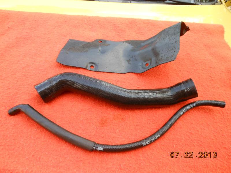 Geo metro gas tank hose set  and cover from a 1996 2 dr hatchback