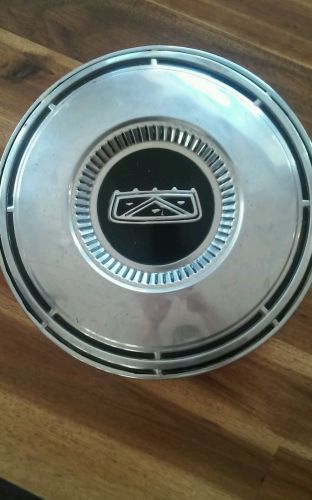 Ford dog dish hubcap.