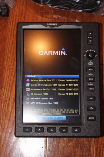 Garmin 696 with four headsets and bag.