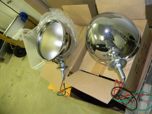 Pair of 12 volt mountable headlight bodies.