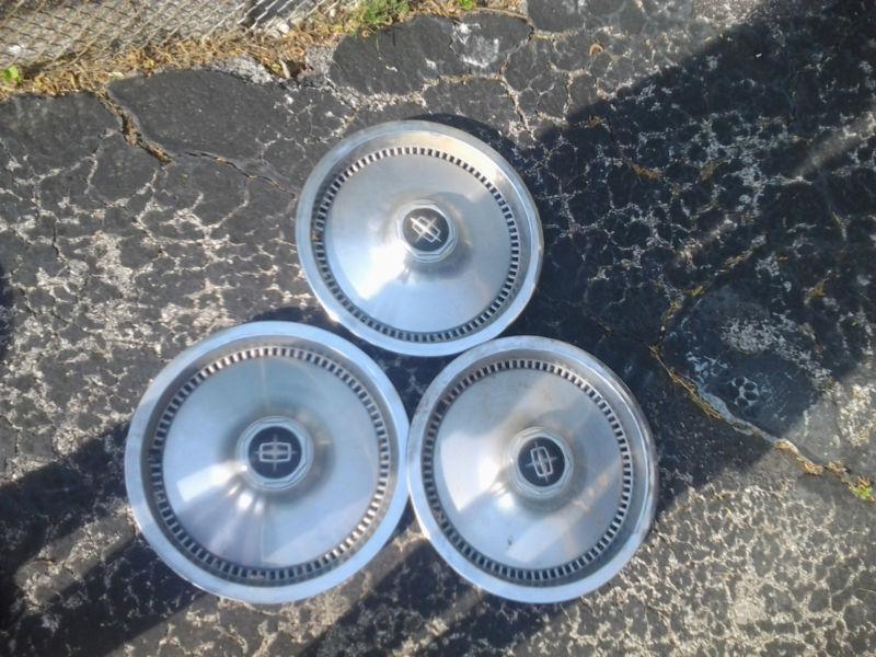 Vintage lincoln hubcaps