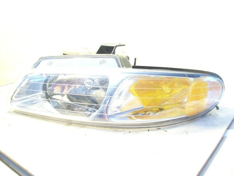96 97 98 99 dodge caravan plymouth voyager town & country left headlight 45214