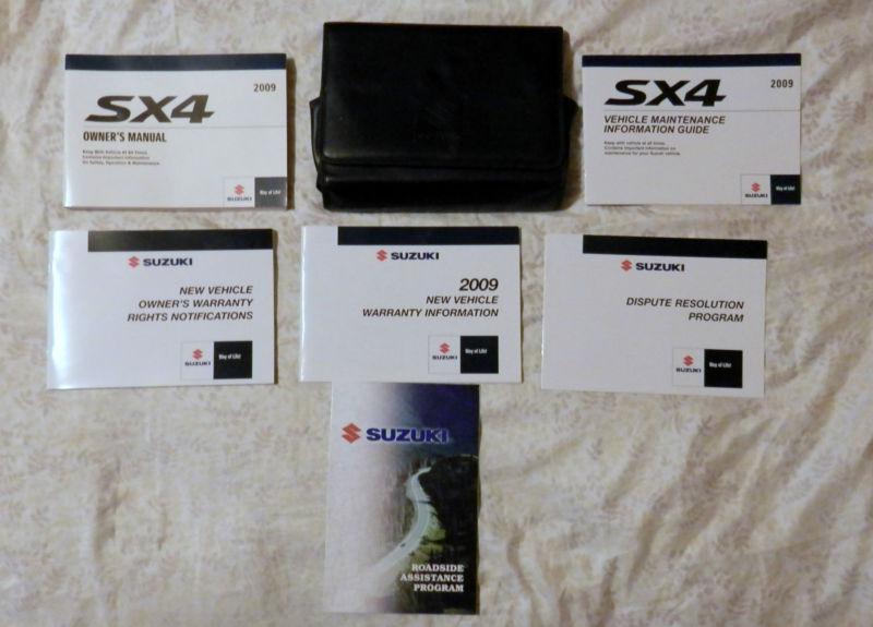 Sx4  2009 suzuki owners owner's manual set w/case