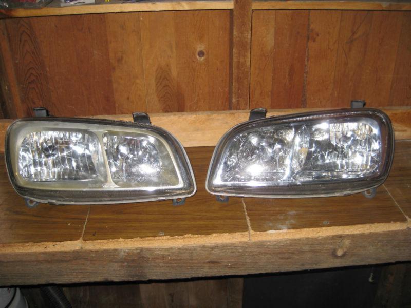Toyota rav4 headlights lh rh used tyc 96 97 98 99 00