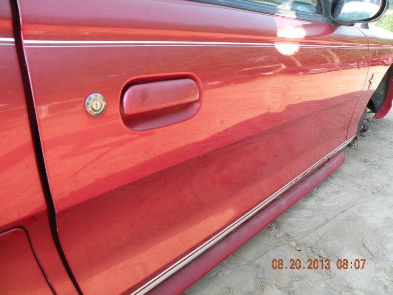 94  ford mustang right front door no mirror has few dents contact for freight