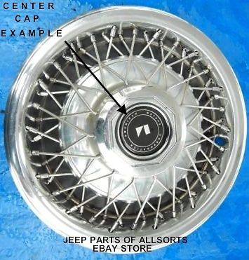 Nos 1980s amc eagles &#034;center cap&#034;  criss-cross wire spoke 15&#034; hubcap wheel cover